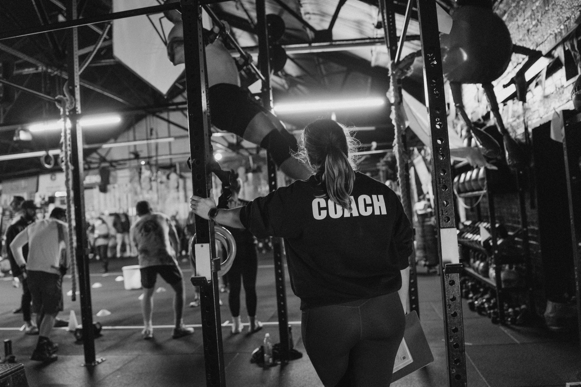 Coach on the floor during a session