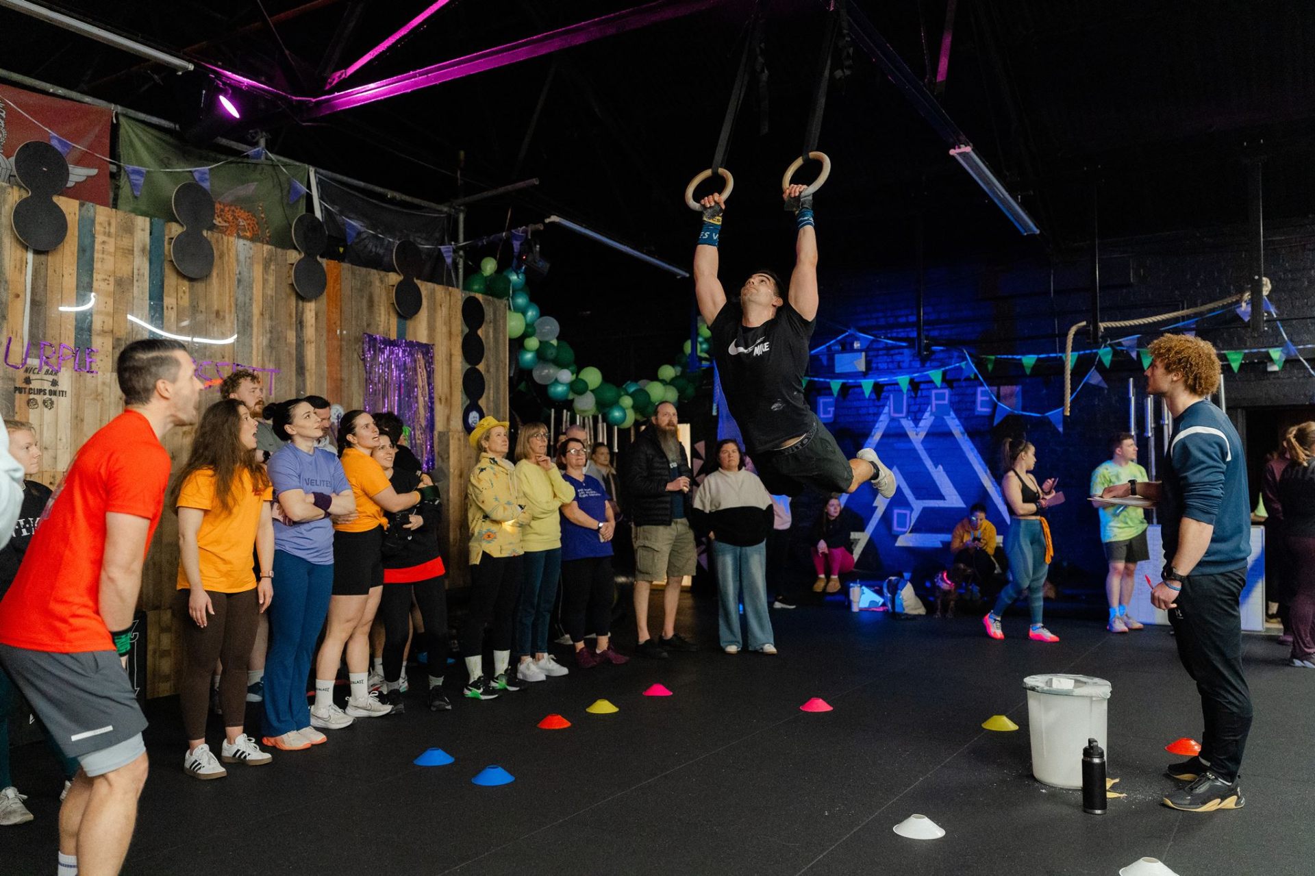 Ring muscle-up in front of a cheering crowd